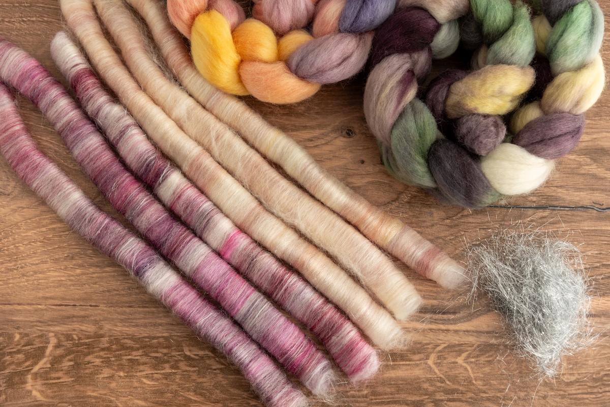 By blending the soft pinks from Wensley’s Field with various shades from the Shadows on Snow colourway, both dyed on Corriedale fibre, plus a touch of Angelina, the contrasting tones come to life, giving off a peaches-and-cream and raspberry sorbet vibe! 