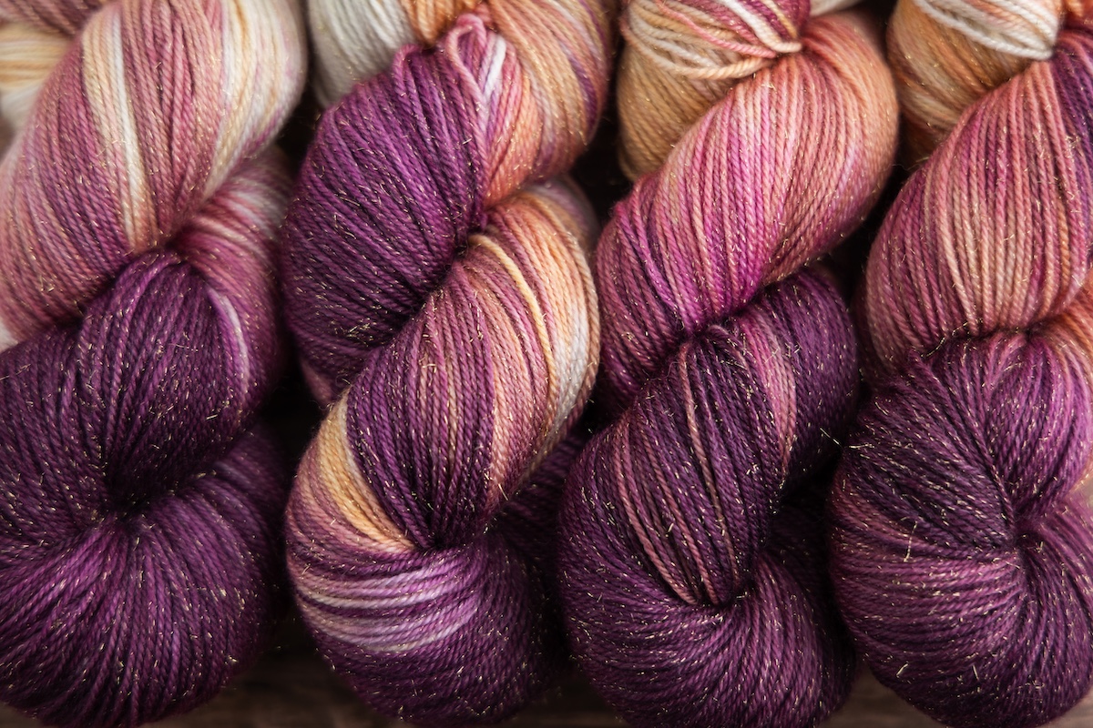 Champagne Dreams Secret Stash Club yarn skeins for March 2025