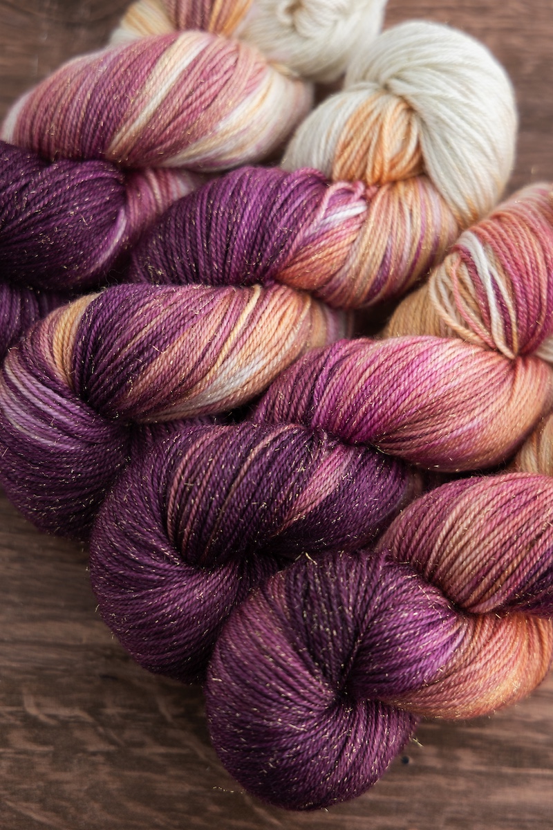 Champagne Dreams Secret Stash Club yarn skeins for March 2025
