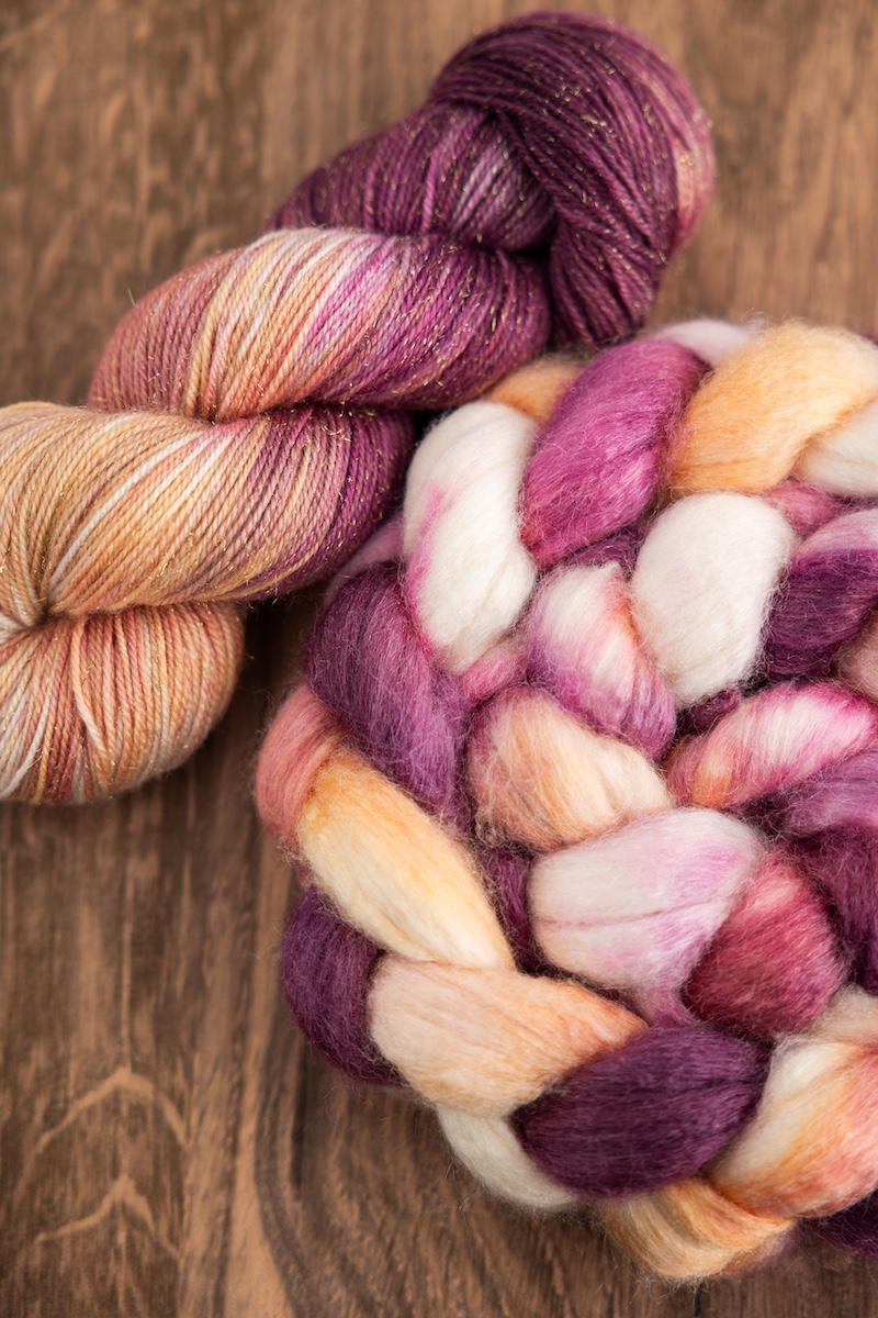 Hand-dyed spinning fibre braid and yarn skein in the March 2025 Secret Stash Club colourway "Champagne Dreams"