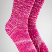 Kelias socks pattern knit in So Kawaii Club colourway