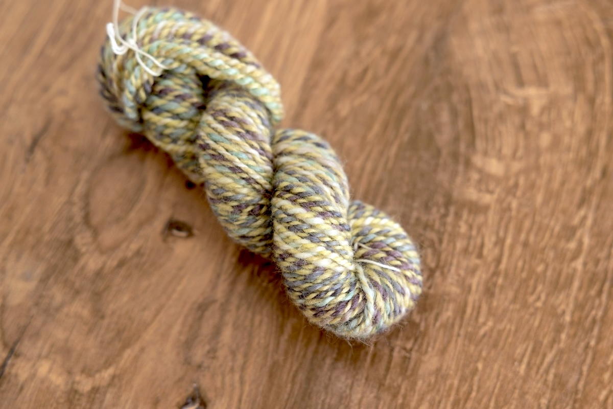 one ply Shadows on Snow, one ply Corriedale/silk blend