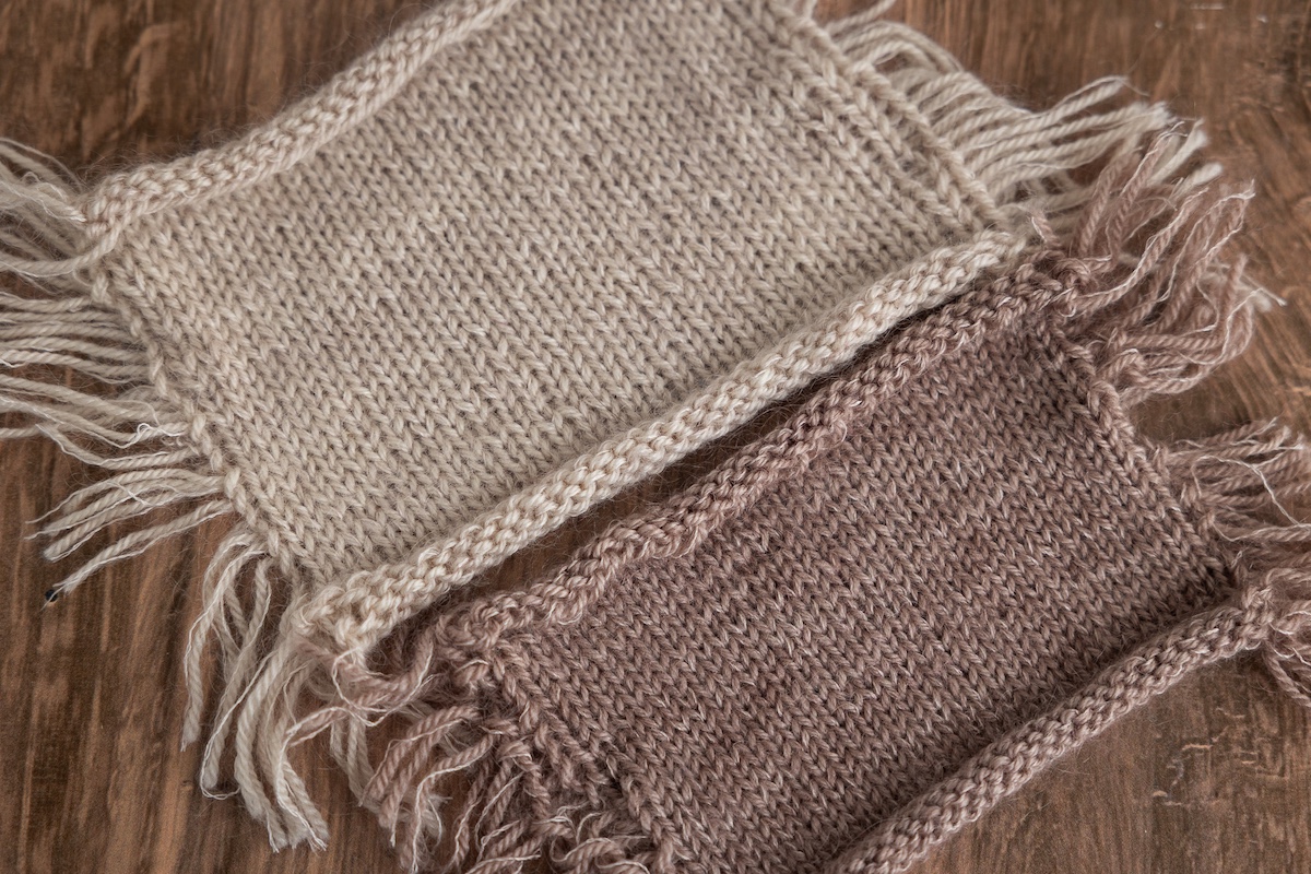 Two stockinette knit guage swatches — in Trifecta Fine + Silk Mist yarn