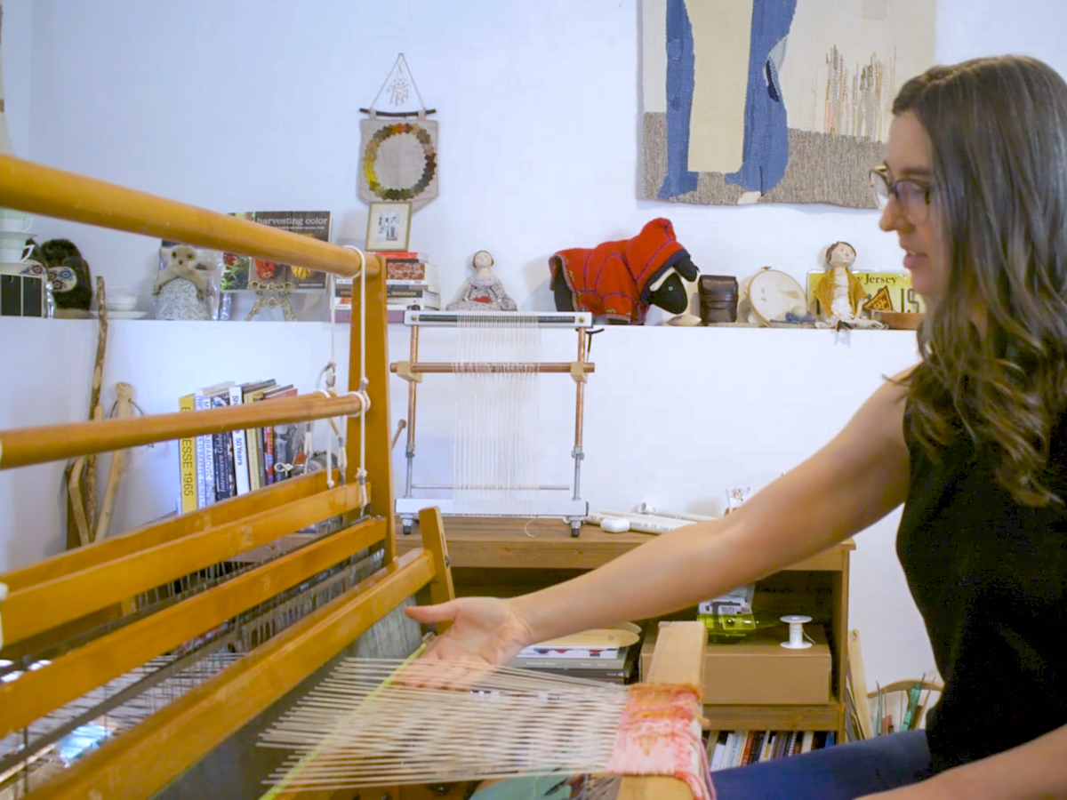 Janna at her counterbalance loom