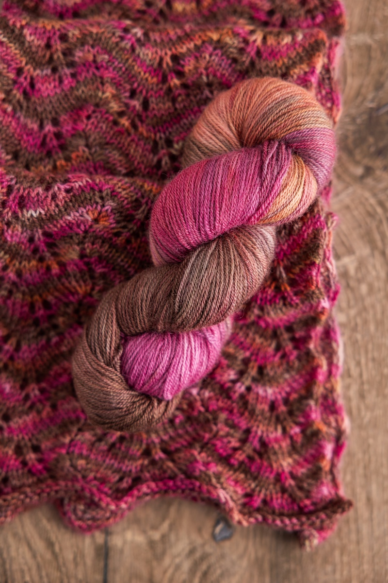 Close up of knit lace stitches in CashSilk Fern Scarf with Apple Picking SweetGeorgia Club yarn