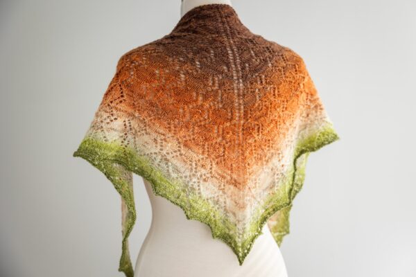 Knit lace shawl in hand dyed yarn gradient