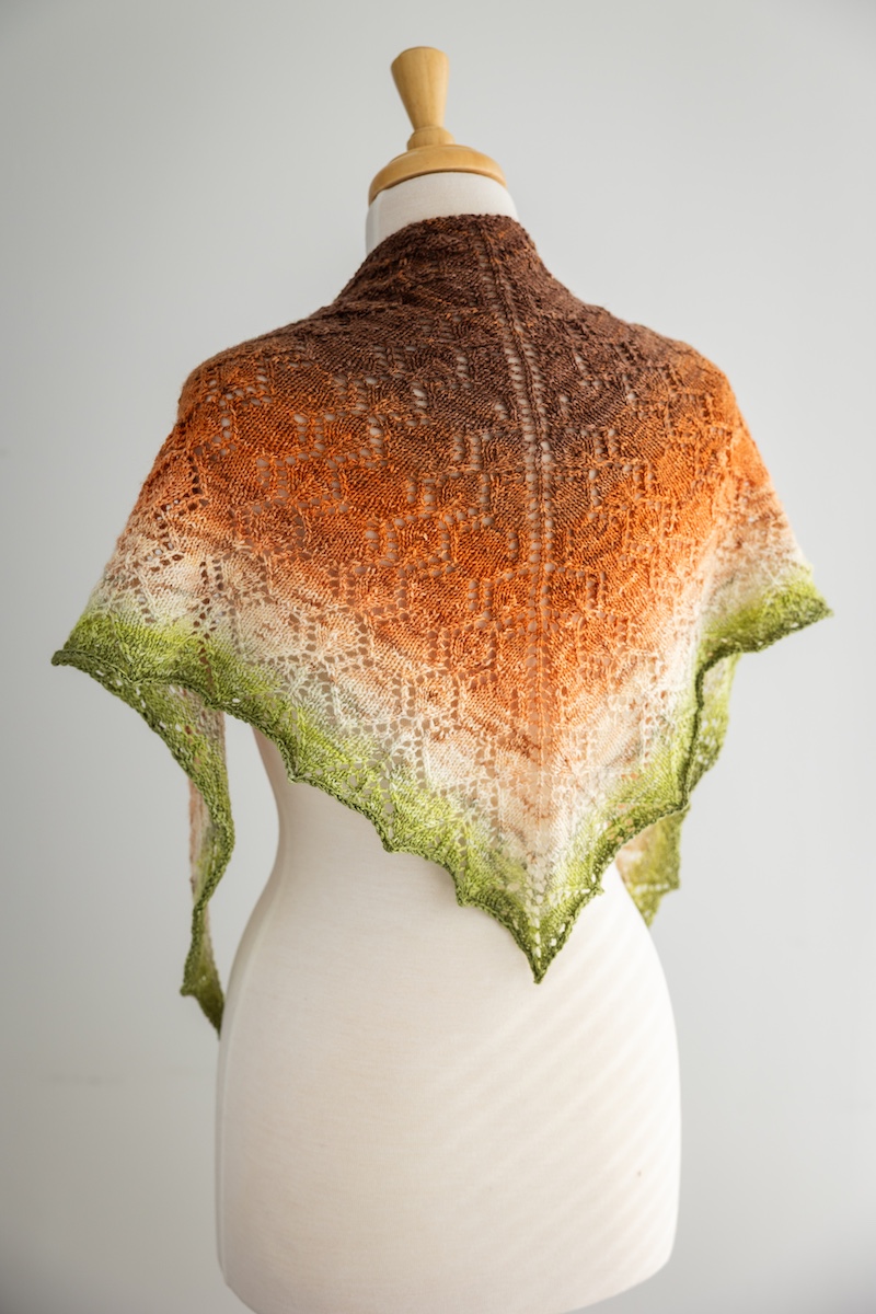 Knit lace shawl in hand dyed yarn gradient