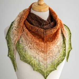 Knit lace shawl in hand dyed yarn gradient