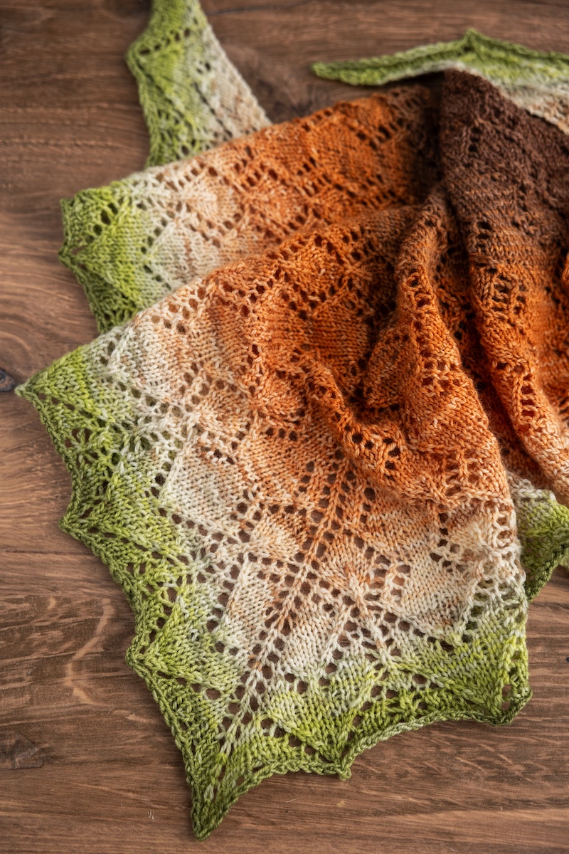 Knit lace shawl in hand dyed yarn gradient