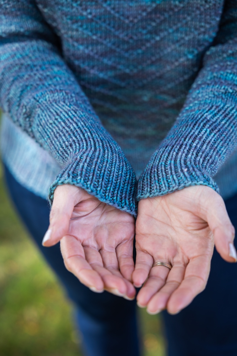 sleeve detail of knit sweater
