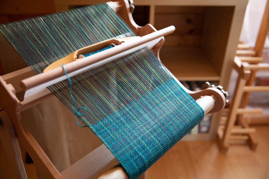 Square One handwoven scarf being woven on a rigid heddle loom