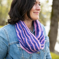 Lace and garter stitch cowl knit in hand-dyed yarn