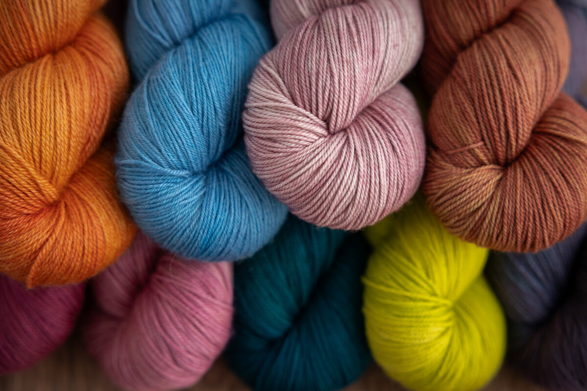 Hand dyed yarn in a palette of popular colours trending for spring and summer 2026