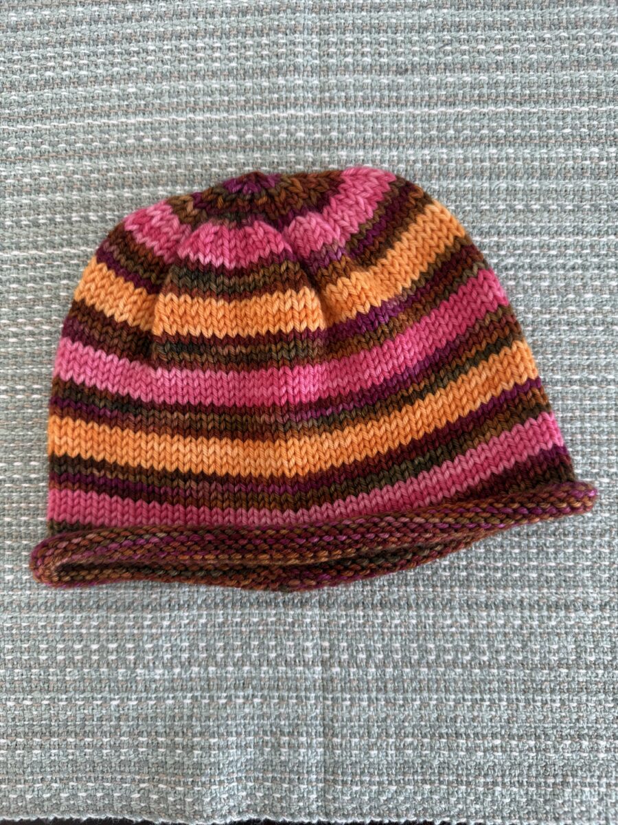 Machine-knit hat.