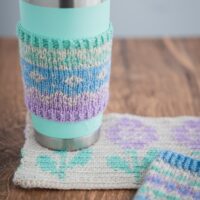 Knit mug cozy and crochet colourwork using Secret Stash Club yarn mini-skeins