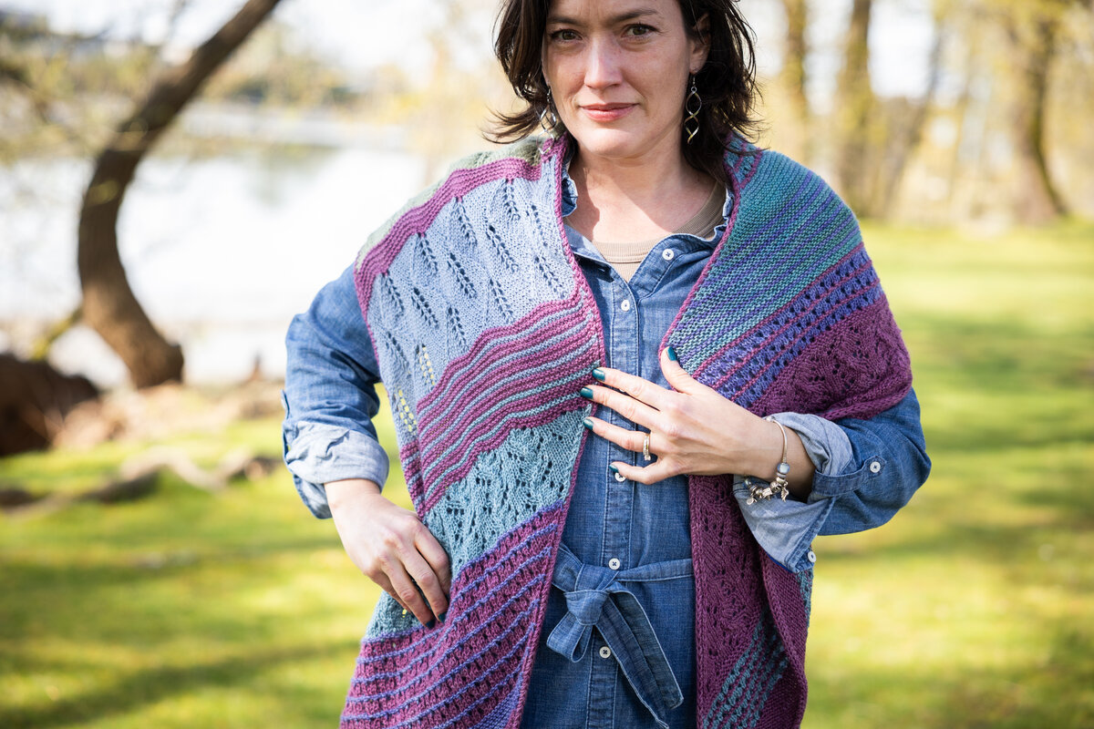 Design by Charlotte Lee
Knit in Trifecta Fine Black Raspberry (MC) and Lavender, Mermaid, Blue Canoe, Clearwater, and Sage (CC)

Summer Spectra KAL 2026 Pattern