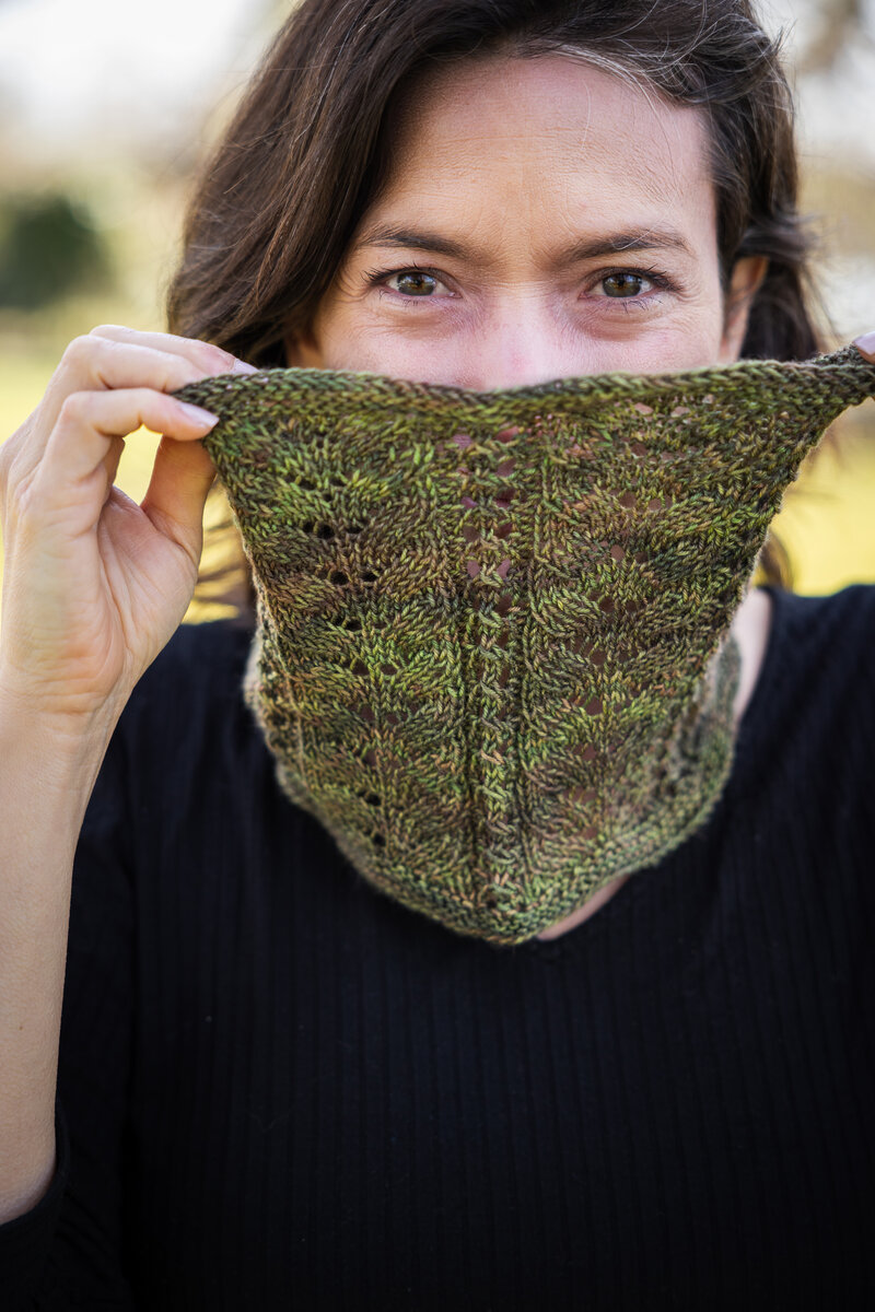 knit lace cowl in hand dyed earthy green yarn
