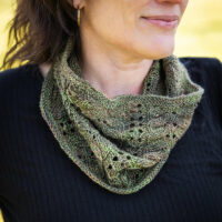 knit lace cowl in hand dyed earthy green yarn