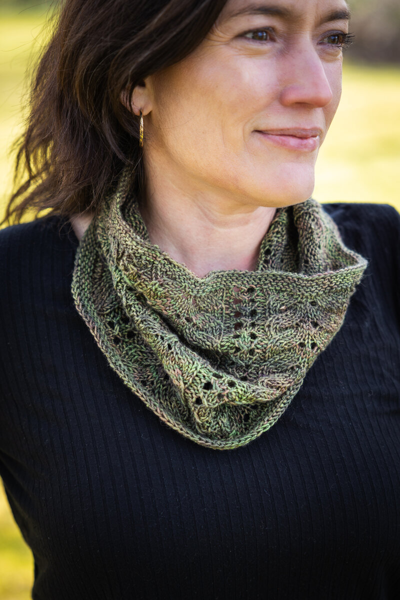knit lace cowl in hand dyed earthy green yarn