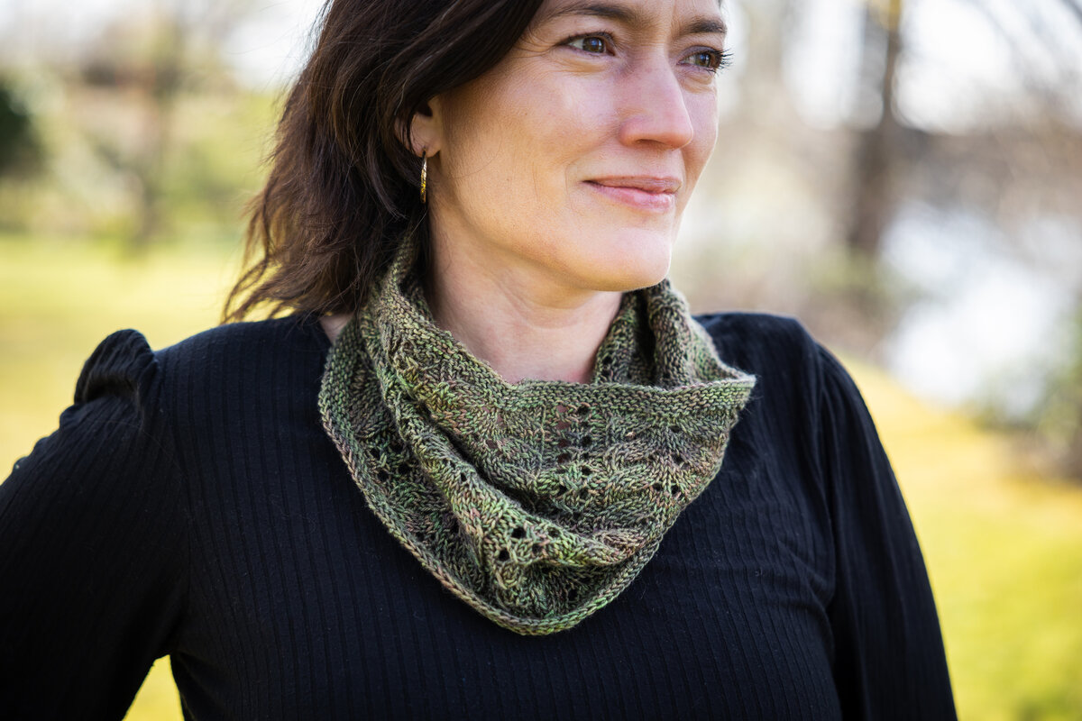 knit lace cowl in hand dyed earthy green yarn
