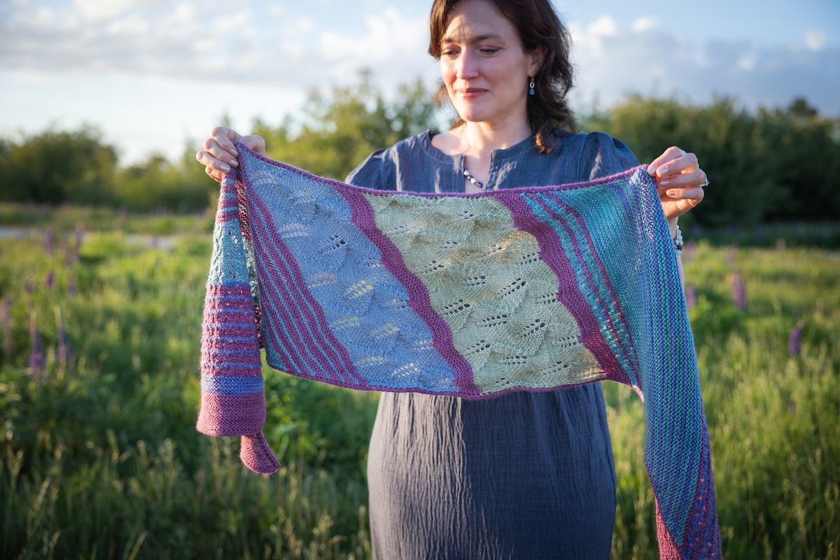 knit shawl with garter ridges and lace sections