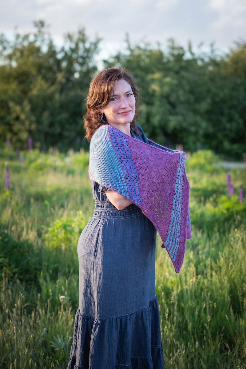 knit shawl with garter ridges and lace sections