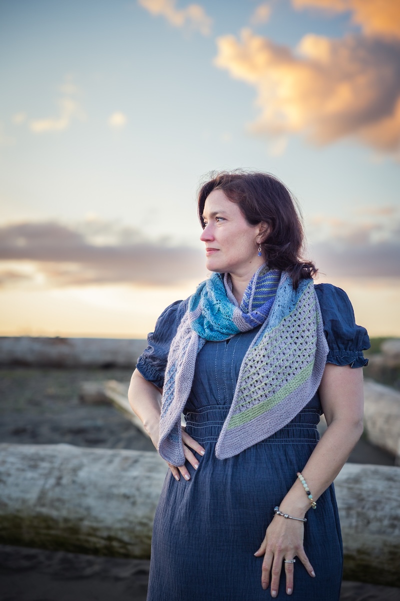 knit shawl with garter ridges and lace sections