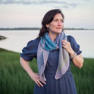 knit shawl with garter ridges and lace sections