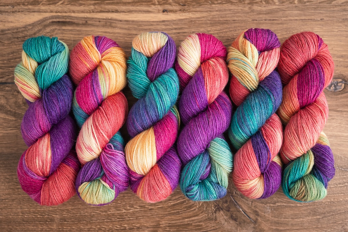 Colourful hand-dyed yarn skeins by SweetGeorgia on a bamboo and wool blend yarn
