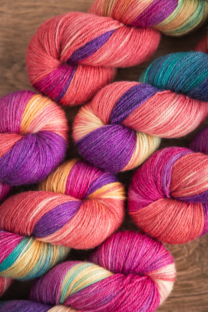 Colourful hand-dyed yarn skeins by SweetGeorgia on a bamboo and wool blend yarn