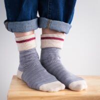 Socks hand knit on a circular sock machine