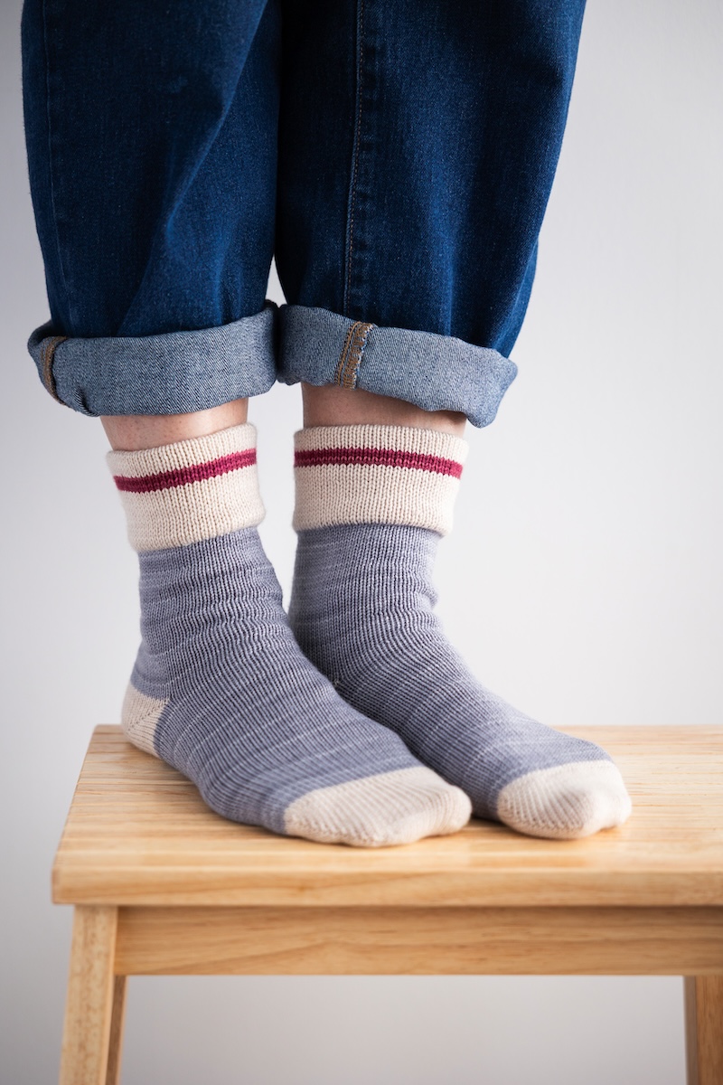 Socks hand knit on a circular sock machine