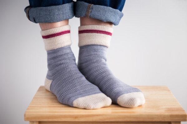 Socks hand knit on a circular sock machine